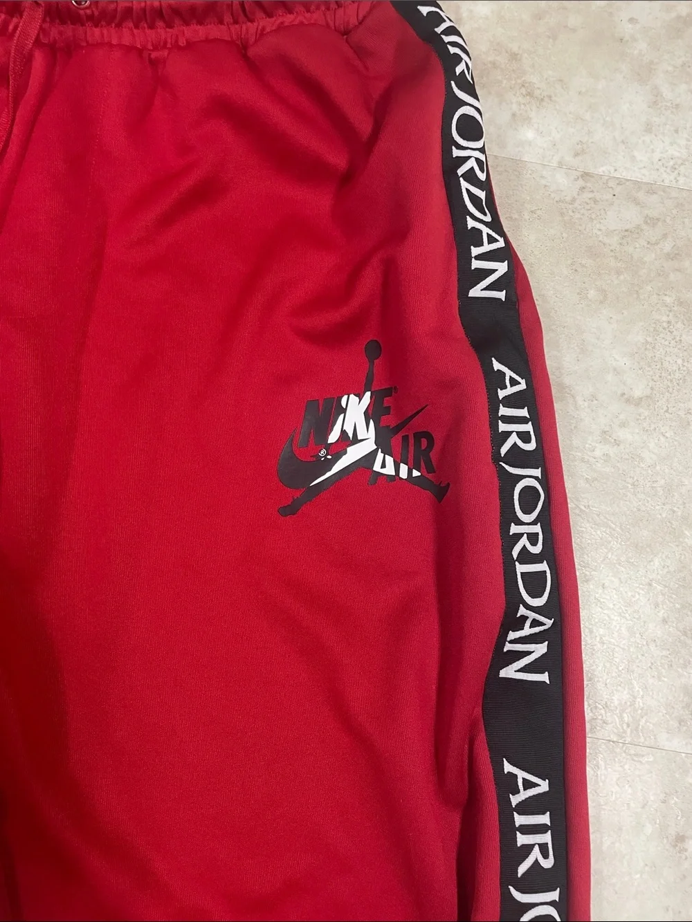 Jordan mens Red Track Joggers with Black Side Logo Tape XL